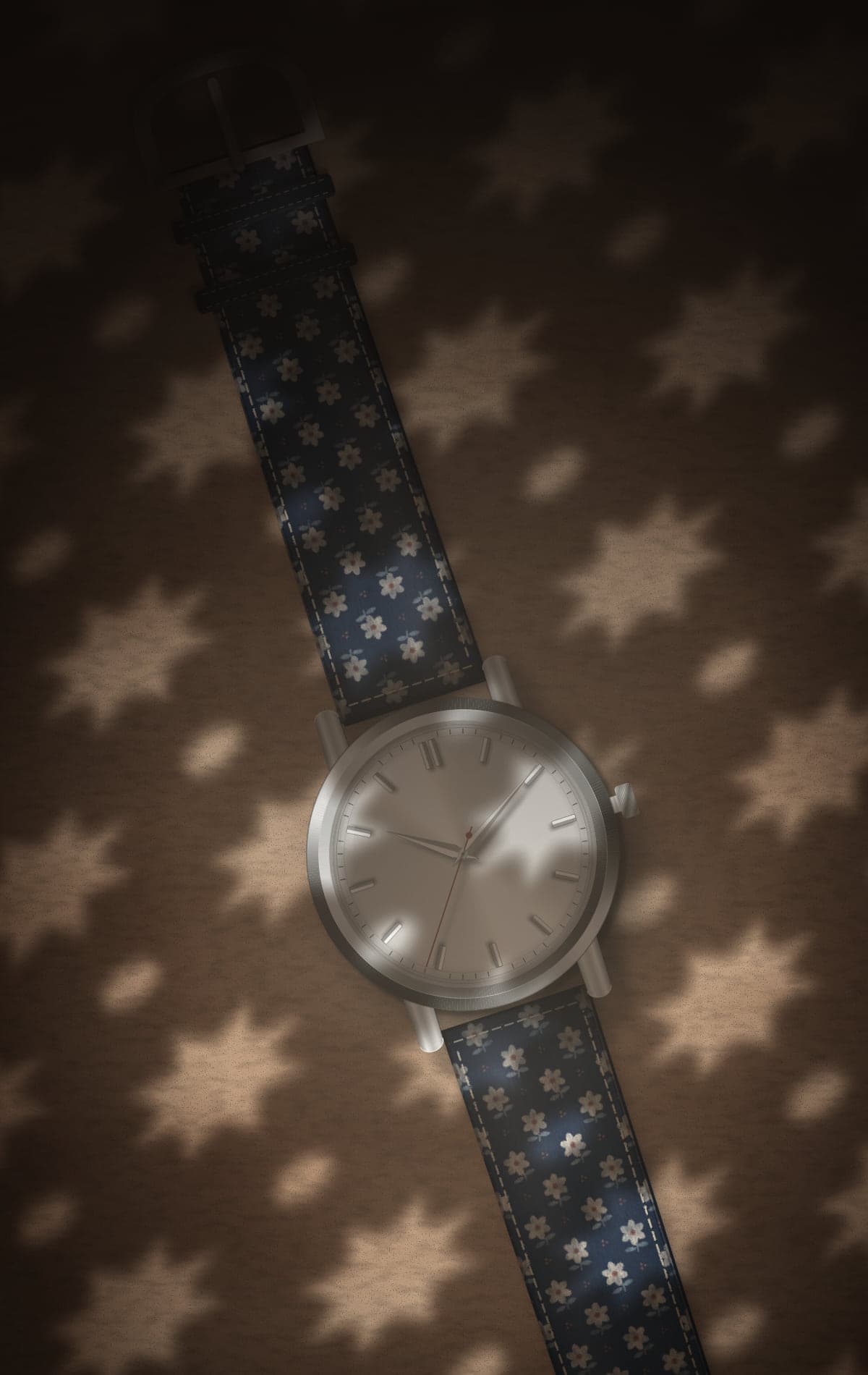 Concept render: an unbranded steel analog watch on the Sanganer Indigo strap, resting on sandstone in star-shaped light from a jaali screen.